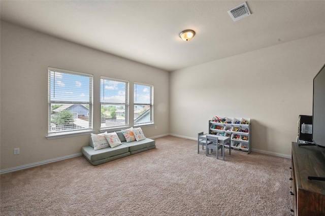 8716 Mina Dr, Austin, TX 78747 - sitting room with carpet flooring and baseboards