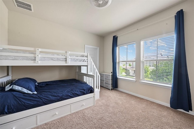 8716 Mina Dr, Austin, TX 78747 - carpeted bedroom featuring baseboards