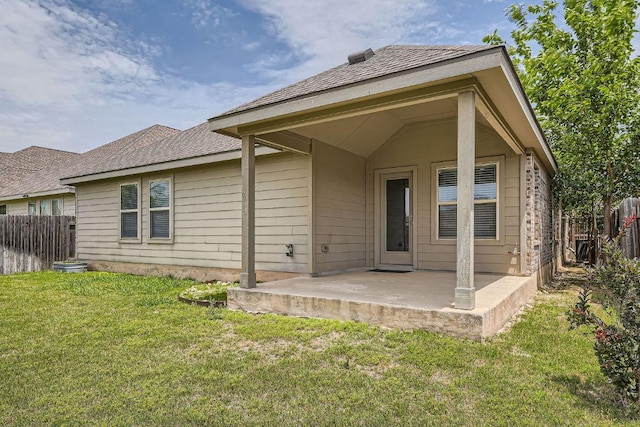 rear view of house with a patio