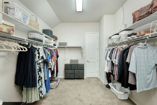 2909 Saint Paul Rivera, Round Rock, TX 78665 - spacious closet featuring carpet flooring and lofted ceiling