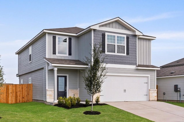 view of front of property with a garage, stone siding, concrete driveway, and board and batten siding