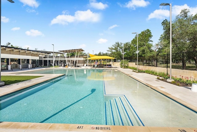 community pool with fence