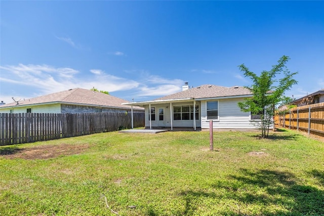 140 Shenandoah Trl, Elgin, TX 78621 - back of property featuring a patio