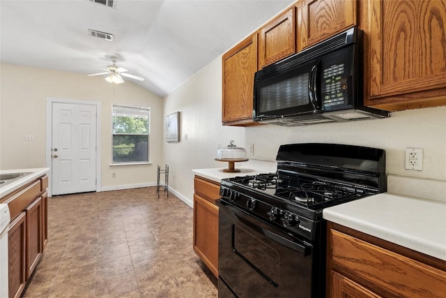 140 Shenandoah Trl, Elgin, TX 78621 - kitchen with black appliances, brown cabinets, ceiling fan, lofted ceiling, and light countertops
