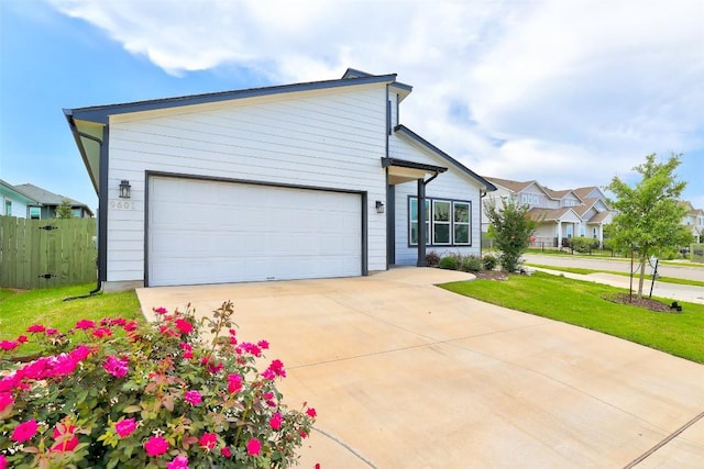 9601 Eloquence Dr, Manor, TX 78653 - view of front of property featuring concrete driveway and an attached garage