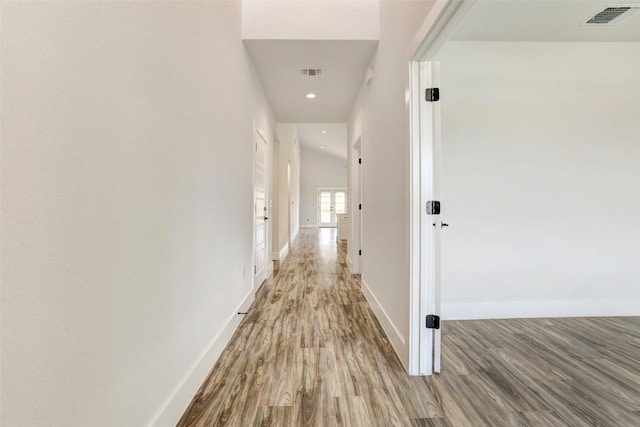 9601 Eloquence Dr, Manor, TX 78653 - hallway with wood finished floors and recessed lighting