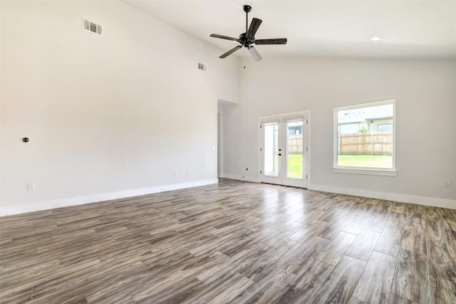 9601 Eloquence Dr, Manor, TX 78653 - unfurnished room featuring wood finished floors, a ceiling fan, and high vaulted ceiling