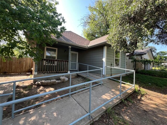 7205 Bethune Ave, Austin, TX 78752 - view of front of house with roof with shingles