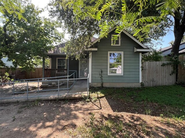 7205 Bethune Ave, Austin, TX 78752 - bungalow-style home with a deck