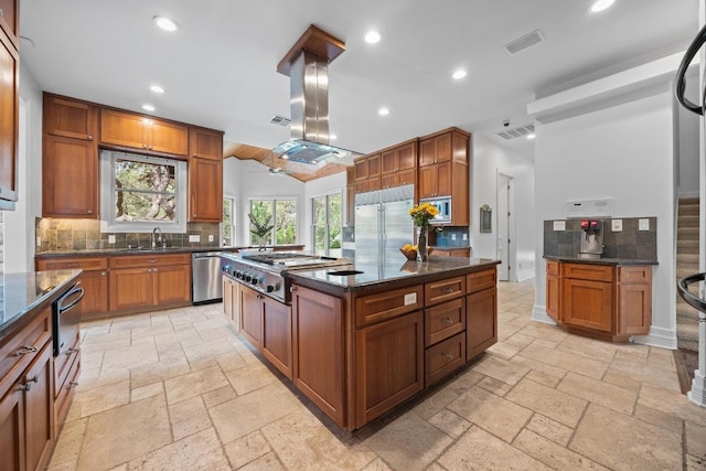 106 Sendera Bonita, Austin, TX 78734 - kitchen with built in appliances, stone tile flooring, recessed lighting, tasteful backsplash, and a warming drawer