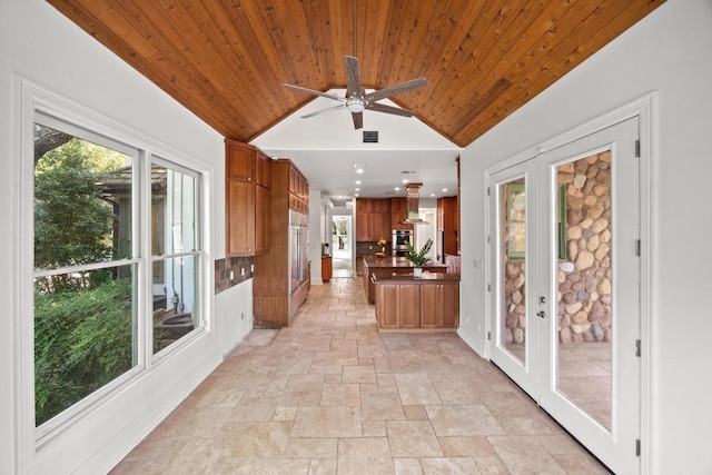 106 Sendera Bonita, Austin, TX 78734 - unfurnished sunroom featuring lofted ceiling and french doors
