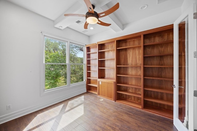 106 Sendera Bonita, Austin, TX 78734 - unfurnished room with beamed ceiling, a ceiling fan, and wood finished floors