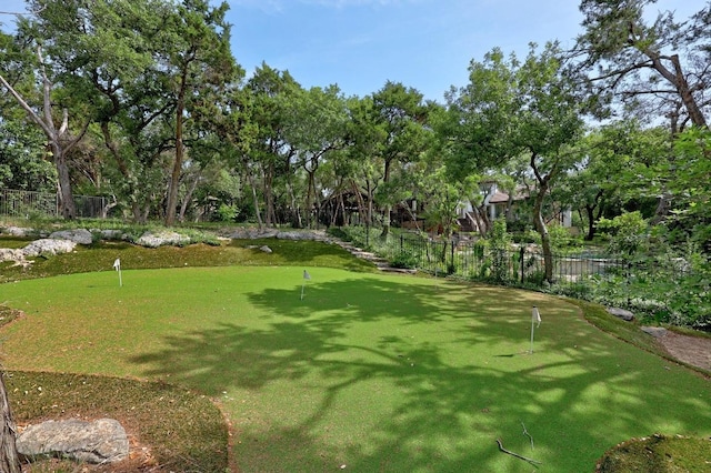 106 Sendera Bonita, Austin, TX 78734 - view of community with an area to practice putting and view of scattered trees