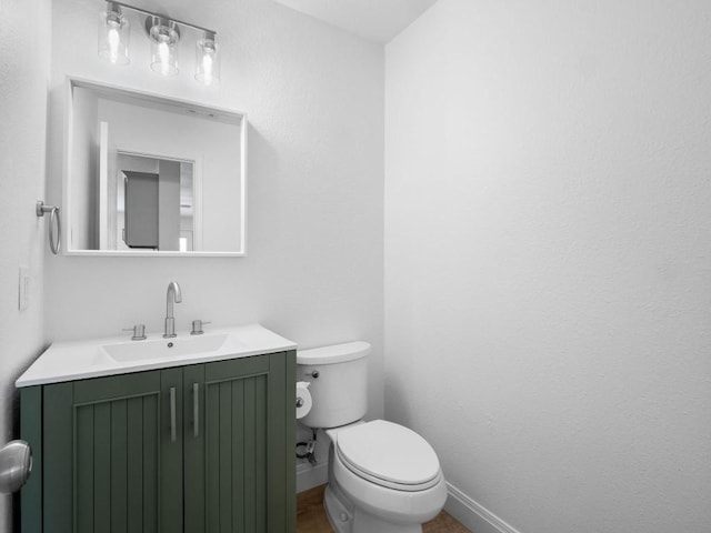 109 Orange Tree Ln, Georgetown, TX 78626 - half bath with toilet, baseboards, and vanity