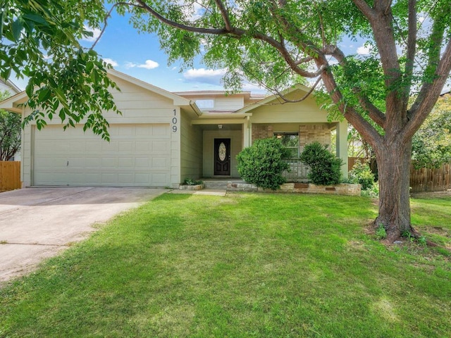 109 Orange Tree Ln, Georgetown, TX 78626 - ranch-style house with concrete driveway and a garage