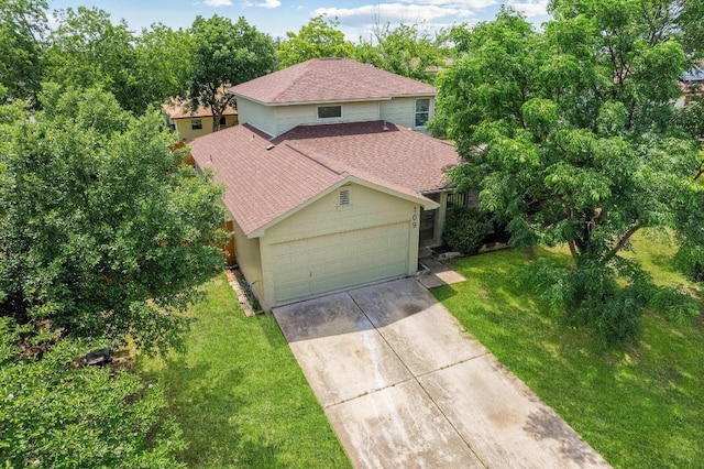 109 Orange Tree Ln, Georgetown, TX 78626 - view of front facade with an attached garage, driveway, a front lawn, and roof with shingles
