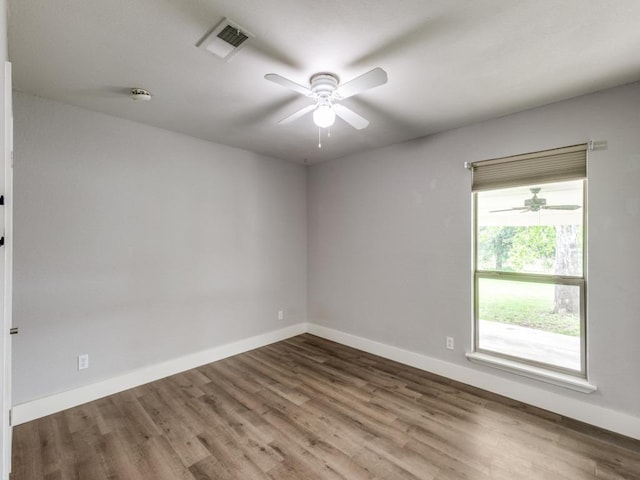 16721 Decker Creek Dr, Manor, TX 78653 - spare room with ceiling fan, wood finished floors, and a smoke detector