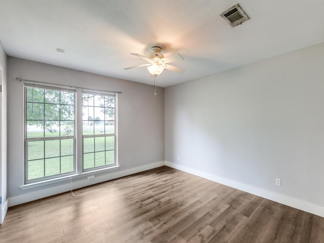 16721 Decker Creek Dr, Manor, TX 78653 - empty room with wood finished floors and ceiling fan