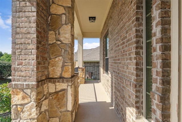21816 Agarito Ln, Spicewood, TX 78669 - view of exterior entry with brick siding