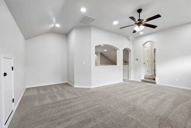 21816 Agarito Ln, Spicewood, TX 78669 - empty room with carpet, a ceiling fan, recessed lighting, arched walkways, and baseboards