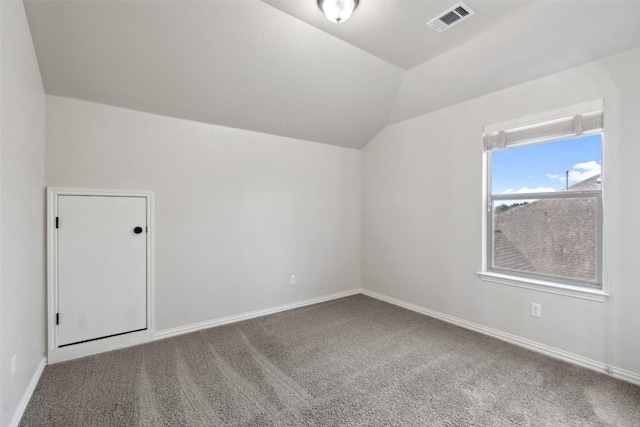 21816 Agarito Ln, Spicewood, TX 78669 - additional living space with vaulted ceiling, carpet, and baseboards