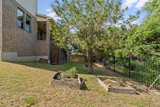 21816 Agarito Ln, Spicewood, TX 78669 - view of yard with a vegetable garden