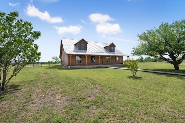 16009 Bobby Rd, Manor, TX 78653 - cabin featuring a porch and a metal roof