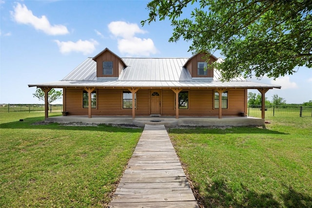 16009 Bobby Rd, Manor, TX 78653 - view of front of property featuring faux log siding and a metal roof