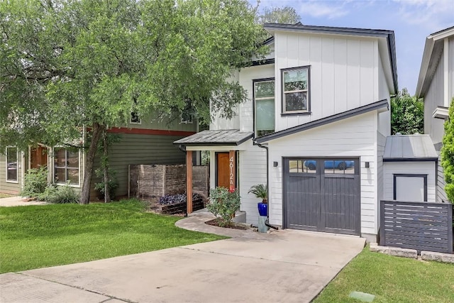 4612 Windy Brook Dr Unit A, Austin, TX 78723 - contemporary home featuring a standing seam roof, metal roof, and a front lawn