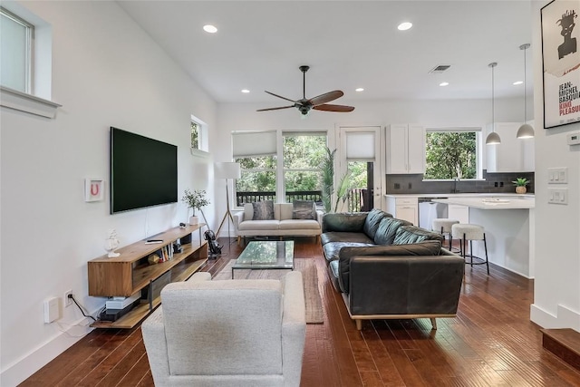 4612 Windy Brook Dr Unit A, Austin, TX 78723 - living area with dark wood-style floors, a ceiling fan, recessed lighting, and baseboards