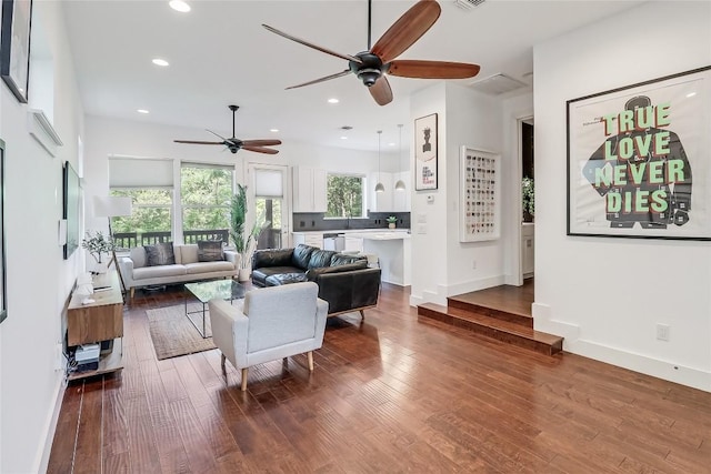4612 Windy Brook Dr Unit A, Austin, TX 78723 - living area featuring a ceiling fan, wood finished floors, recessed lighting, and baseboards