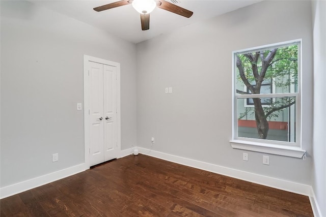 4612 Windy Brook Dr Unit A, Austin, TX 78723 - unfurnished room featuring ceiling fan, baseboards, and dark wood-style flooring