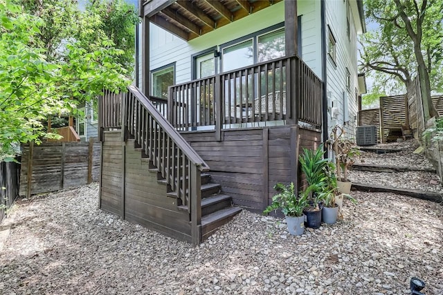 4612 Windy Brook Dr Unit A, Austin, TX 78723 - rear view of house with fence, stairs, central air condition unit, and a deck