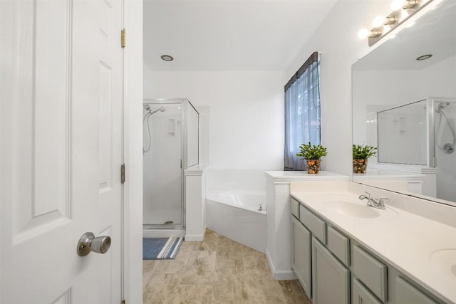 146 Long Shadow Dr, Bastrop, TX 78602 - bathroom with a shower stall, a bath, and double vanity