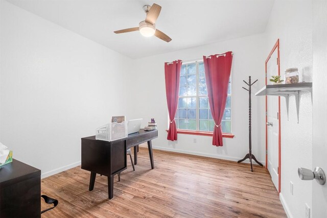 146 Long Shadow Dr, Bastrop, TX 78602 - office featuring wood finished floors, baseboards, and ceiling fan