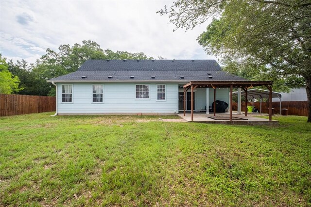 146 Long Shadow Dr, Bastrop, TX 78602 - rear view of house featuring a patio and a shingled roof