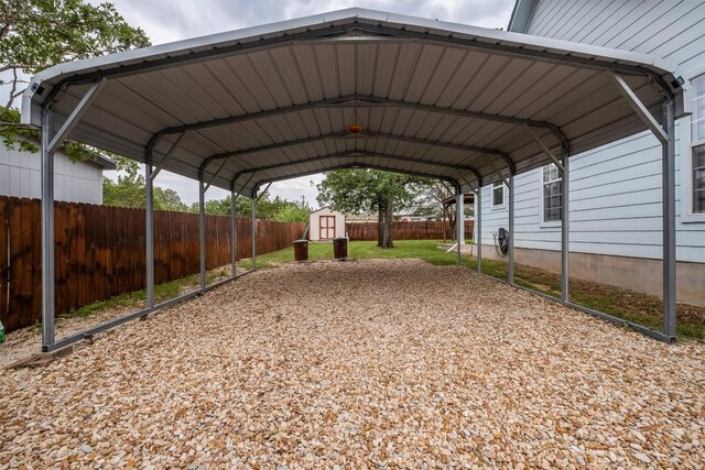 146 Long Shadow Dr, Bastrop, TX 78602 - view of vehicle parking with a storage shed and a detached carport