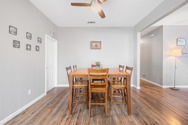 146 Long Shadow Dr, Bastrop, TX 78602 - dining space with ceiling fan, wood finished floors, and baseboards