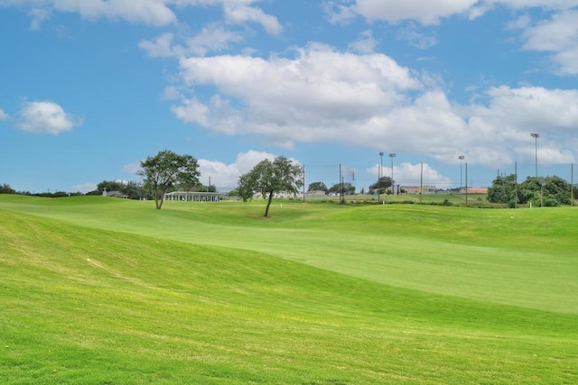 15004 Falconhead Grove Loop, Austin, TX 78738 - view of property's community featuring golf course view and a lawn