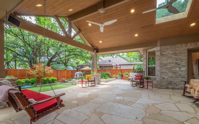 view of patio / terrace with a ceiling fan and a fenced backyard