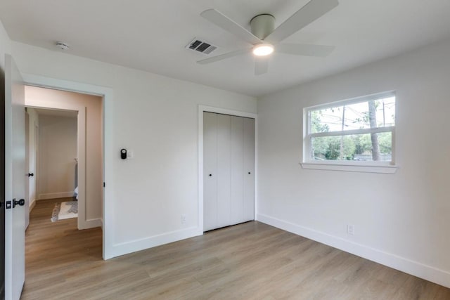 5711 Wellington Dr, Austin, TX 78723 - unfurnished bedroom featuring light wood-style floors, a closet, and ceiling fan