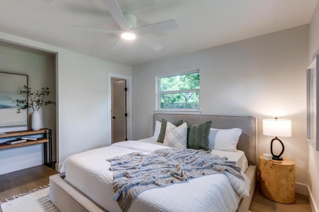 5711 Wellington Dr, Austin, TX 78723 - bedroom with wood finished floors and ceiling fan