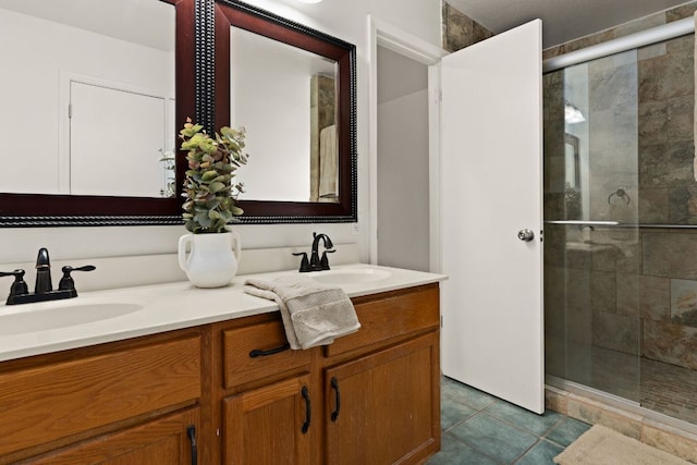 2605 Little Nolan Rd, Killeen, TX 76542 - full bath with a shower stall, double vanity, and tile patterned floors