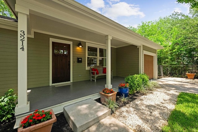 3214 Funston St, Austin, TX 78703 - view of exterior entry with covered porch and driveway