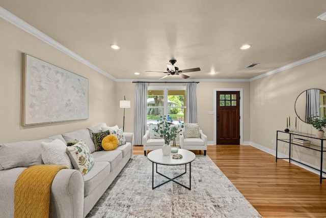 3214 Funston St, Austin, TX 78703 - living area with wood finished floors, recessed lighting, crown molding, and ceiling fan