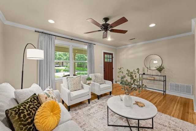 3214 Funston St, Austin, TX 78703 - living area featuring a ceiling fan, light wood-style floors, ornamental molding, and recessed lighting