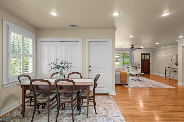3214 Funston St, Austin, TX 78703 - dining area featuring light wood-style flooring, plenty of natural light, recessed lighting, ceiling fan, and ornamental molding