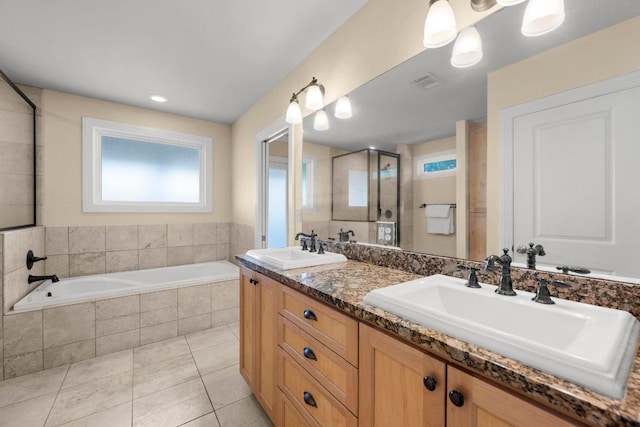 3214 Funston St, Austin, TX 78703 - bathroom featuring double vanity, a garden tub, tile patterned floors, and tiled shower