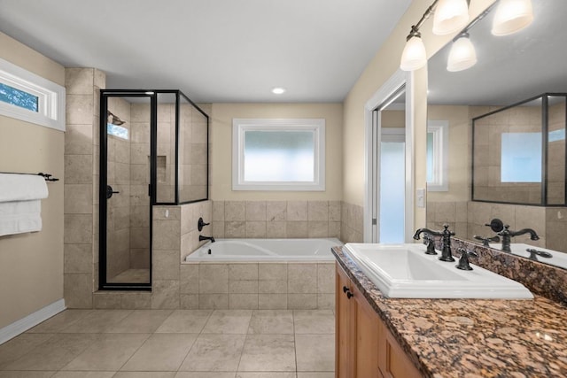 3214 Funston St, Austin, TX 78703 - bathroom with plenty of natural light, a shower stall, a garden tub, and recessed lighting