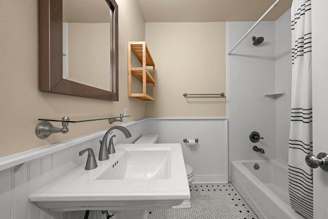 3214 Funston St, Austin, TX 78703 - bathroom featuring wainscoting, shower / tub combo, and tile patterned floors